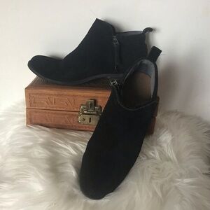 Toms black leather and wool blend side zip 1” heel booties. Size 7